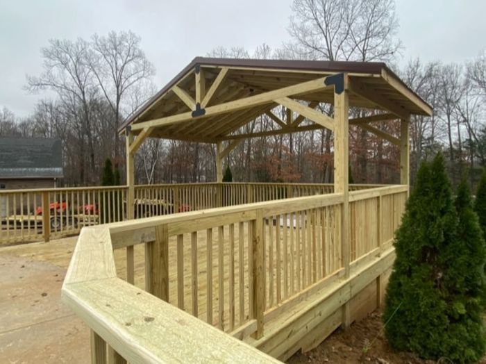 Covered deck with timber-frame pergola roof, M.S. Outdoor Creations