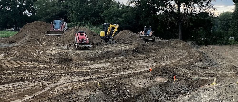 Evening grading and site prep work with heavy equipment near Murray, KY